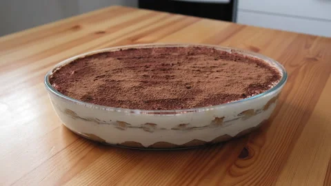 Tiramisu is on the table in the kitchen. Video stock 196892906