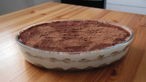 Tiramisu is on the table in the kitchen. Video stock 196893143