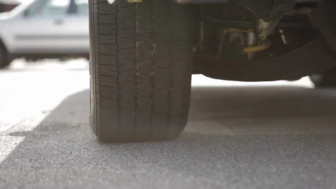 Tire and Underside of Car Stock-Footage 102526876