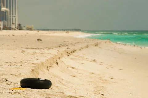 Tire on the beach Stock Photos