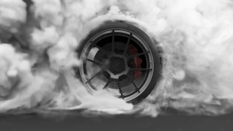 Tire Burnout. Burning rubber and Smoking tire with a rotating wheel Stock Footage