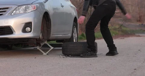 Tire change problems on the road Video stock 248727785