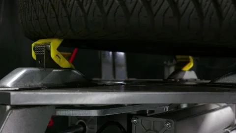 Tire Changer Removing Tire Bead from Rim Using Demounting Head Hooks Stock Footage 336804613
