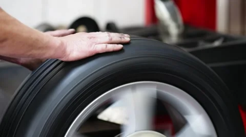 Tire check on balancing machine Stock Footage 54234590