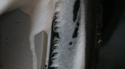Tire Cleaner Foam Dripping Stock Footage 68854604