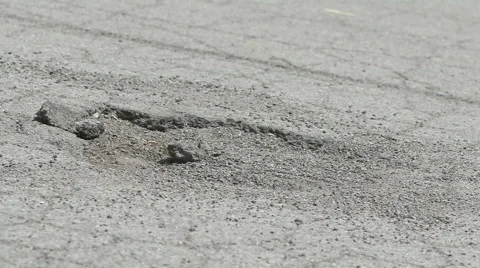 Tire Hits Pothole Close Up Angled Slow Motion Stock Footage 65730514