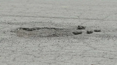 Tire Hits Pothole Low Angle Slow Motion Stock Footage 65730501