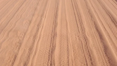 Tire marks on a sandy road Stock Footage 120355712
