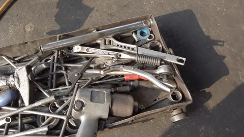 Tire patch at a motor repair store Stock Footage 102493077