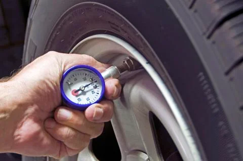Tire pressure Stock Photos