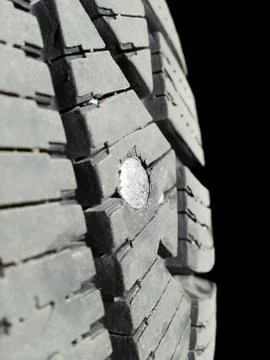 Tire puncture Stock Photos