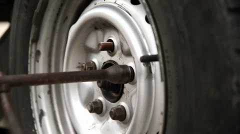 Tire removal, loosing screws. Video stock 33205347