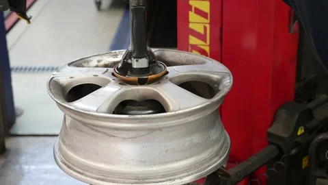 Tire repairer at mechanical work Stock Footage 137252333