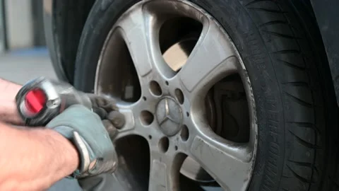 Tire repairer at mechanical work Stock Footage 137252498