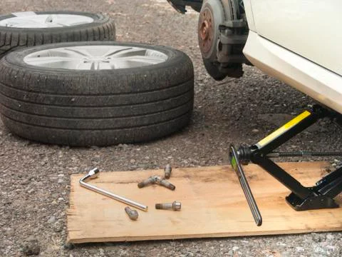 Tire replacement on a road Photos