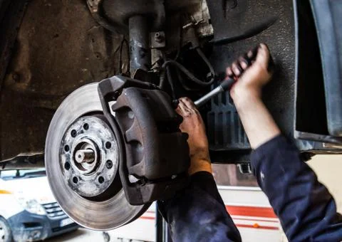 Tire replacement service, fitting with balancing, change to winter Stock Photos