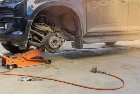 Tire replacement service . Stock Photos