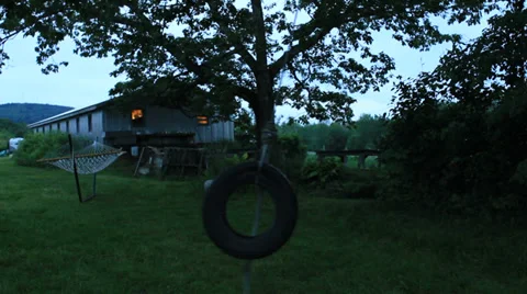 Tire swing at local farm Stock Footage 28504905