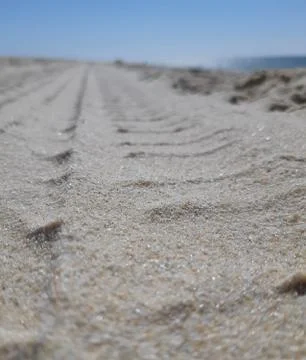 Tire Track Pattern on Sand Stock Photos