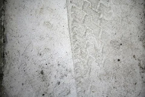 Tire tracks on cemented surface Stock Photos