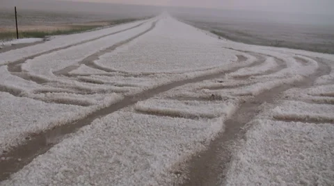 Tire Tracks in Hail Stock Footage 54756799