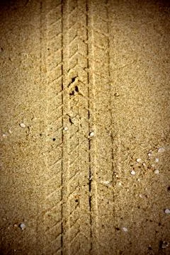 Tire tracks on sand Stock Photos