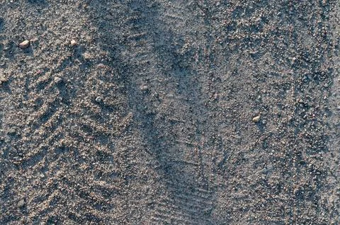 Tire Tracks on Sandy Ground Texture Stock Photos