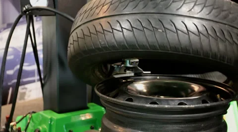Tire tyre being mounted on a wheel Видео 39526853