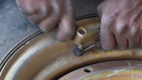 Tire Valve Installation Stock Footage 336432720
