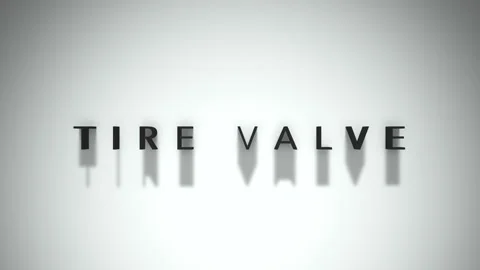 Tire valve intro title matte black writing against a white base layer Stock Footage 301837784