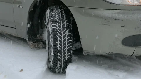 Tire on winter road , close-up Stock Footage 58800849