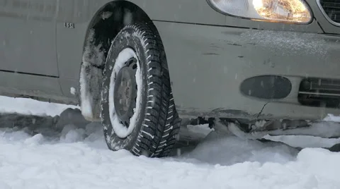 Tire on winter road , close-up Stock Footage 58800853