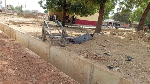 Tired Barrow Pusher Resting Under Tree By Roadside Kano Nigeria 動画素材 329481845