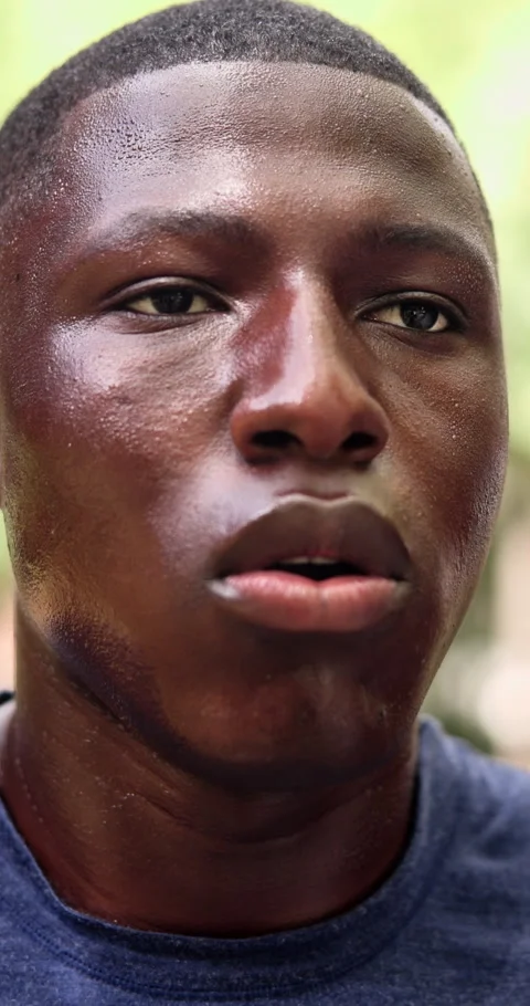 Tired, black man and sweat in nature for fitness, exercise and exhausted from Stock Footage 340750137