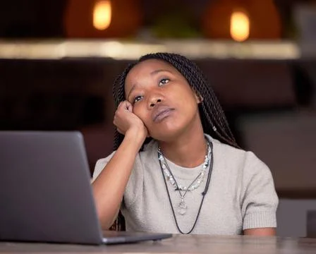 Tired, bored and thinking black woman at work with depression, stress and sad Stock Photos