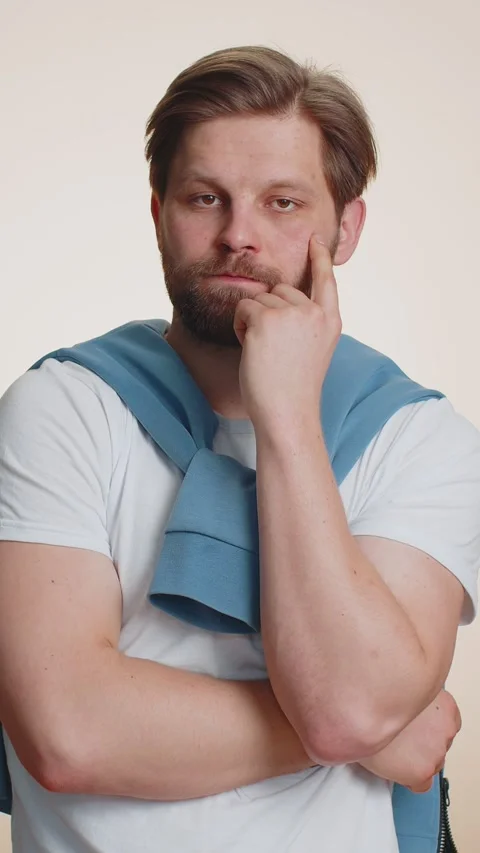 Tired bored man indifferent expression, exhausted of tedious story, not Stock Footage 347055822