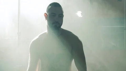 Tired boxer after training in gym sweating slow motion intense expression Stock Footage 80966523