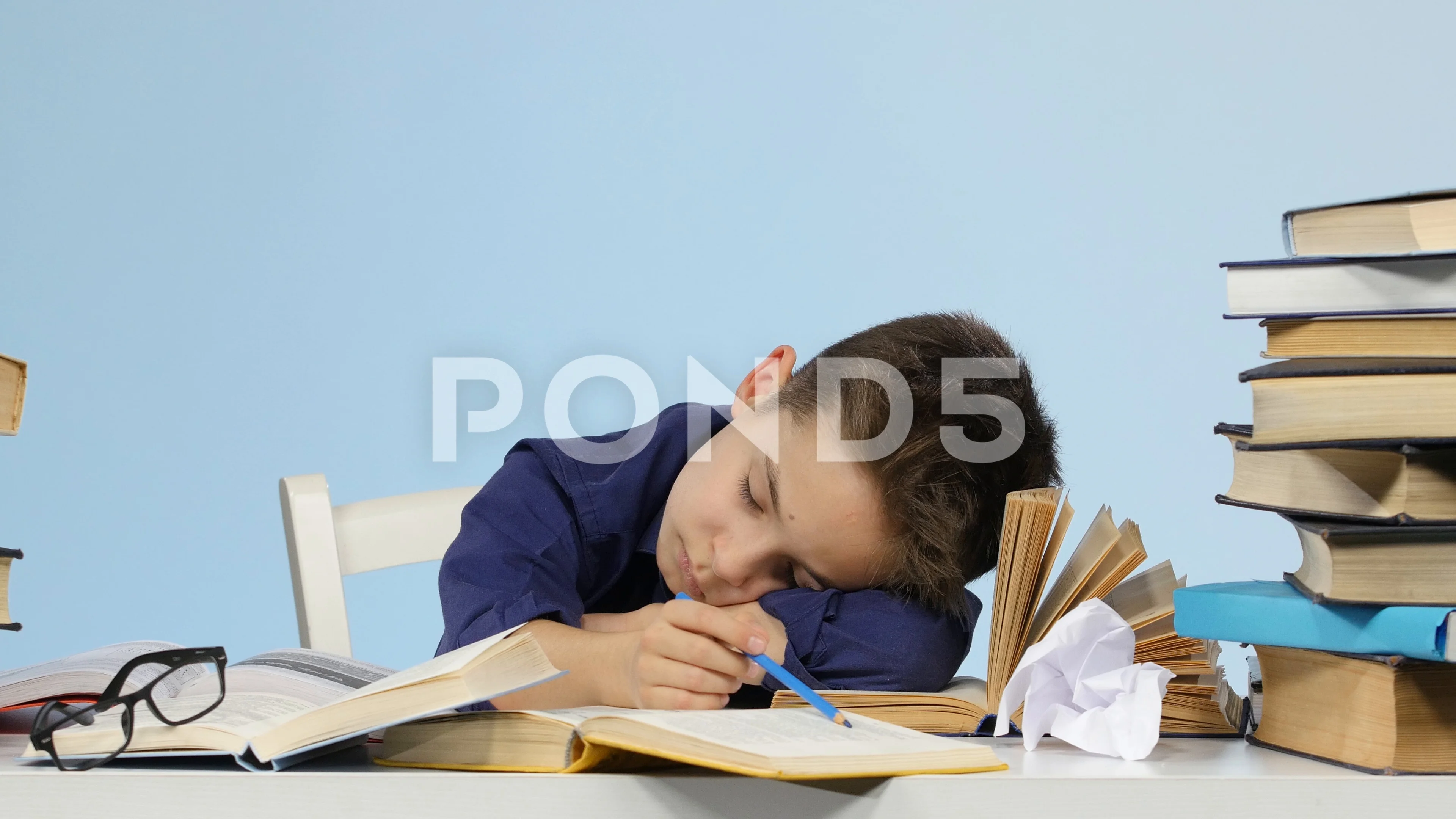 Tired Boy Fell Asleep At A Desk Between Stock Video Pond5