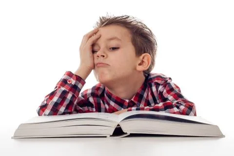 Tired boy from studying Stock Photos