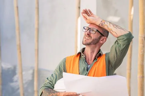 Tired builder fatigue worker from hard working hot weather summer high UV s.. Stock Photos