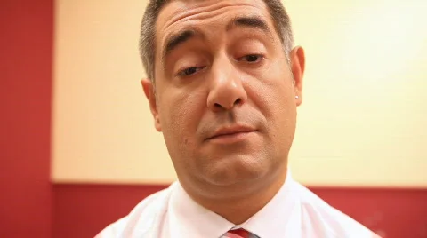 Tired businessman falling asleep Stock Footage