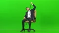 The tired businessman sitting on the office chair on the green background 4k or 4k+ Resolution