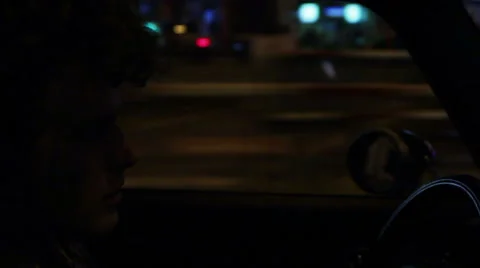 Tired driver riding through the night Stock Footage 41573324