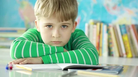 A tired elementary school student in class. Stock Footage 74426351