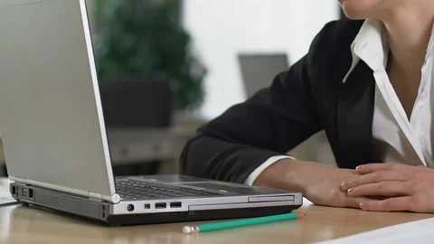 Tired employee falling asleep on table, overwork exhaustion, tasks fatigue Stock Footage 107357605
