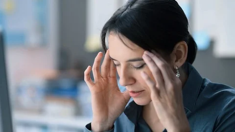 Tired employee with headache Stock Footage 89197996