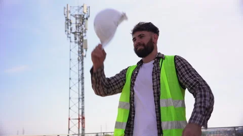 Tired Engineer Take A Break and Take Off Hard HARD HAT AFTER test THE Commu.. Stock Footage 262161297