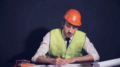 Tired engineer in the workplace Stock Footage 81268317