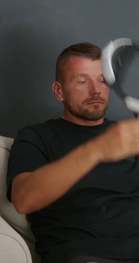 Tired eyes after using VR goggles. Man tired after virtual reality. Stock Footage 257992730