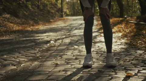 Tired female runner taking a break Stock Footage 56917560